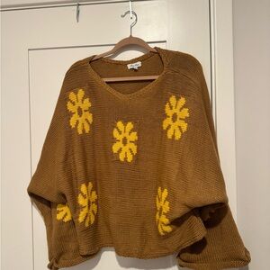 Cozy Brown V-Neck Sweater with Yellow Floral Accents